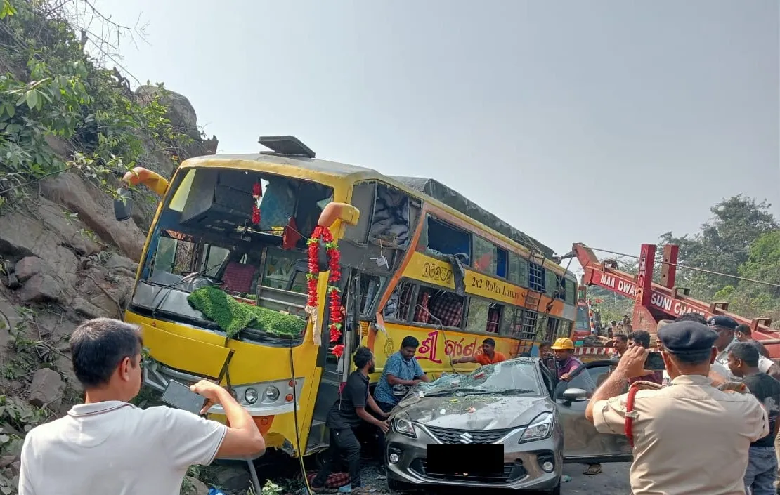 bus overturned on car