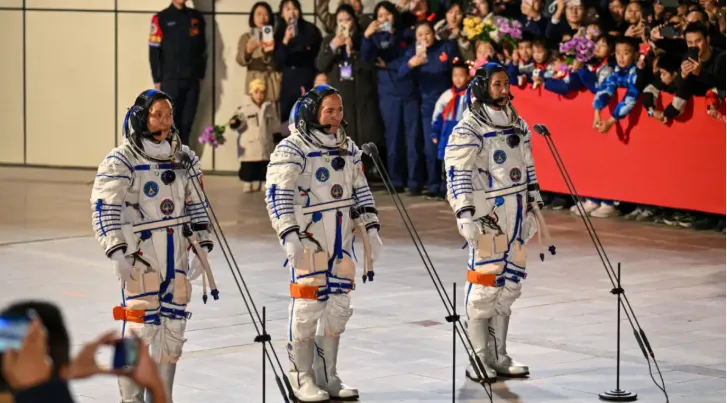 China's Shenzhou 21 docks 