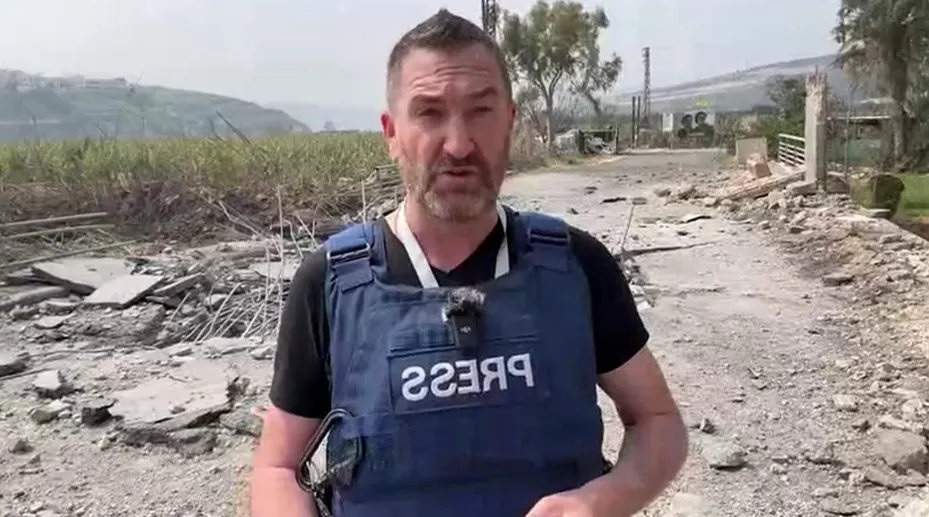 Journalist Under Fire: Steve Sweeney Targeted During Live Coverage